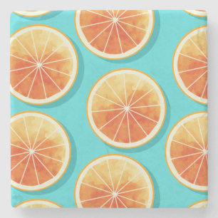 Orangefarbene Scheiben auf blau Steinuntersetzer