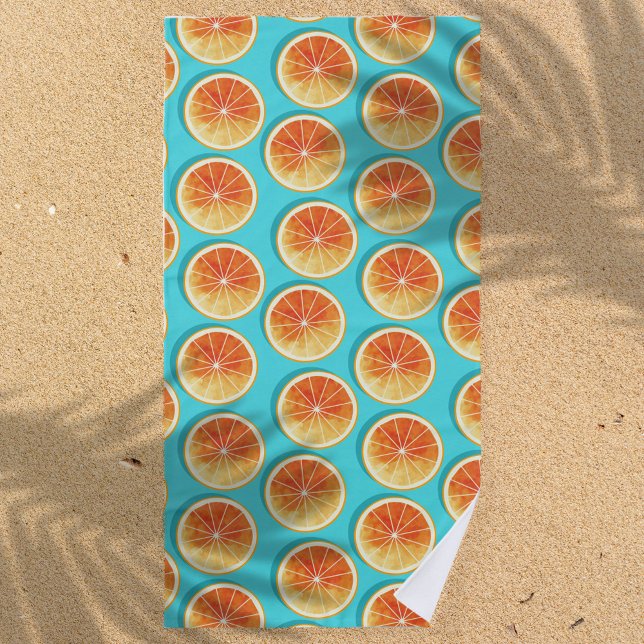 Orangefarbene Scheiben auf blau Strandtuch (Von Creator hochgeladen)