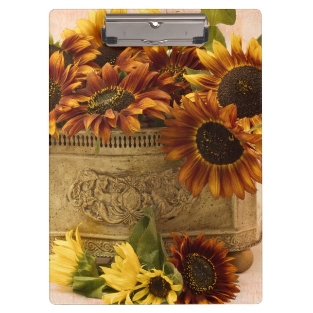 Orangefarbene Sonnenblumen im Körbchen Klemmbrett (Vorderseite)