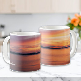 Orangefarbene Sonnenuntergangswolken über dem Indi Kaffeetasse