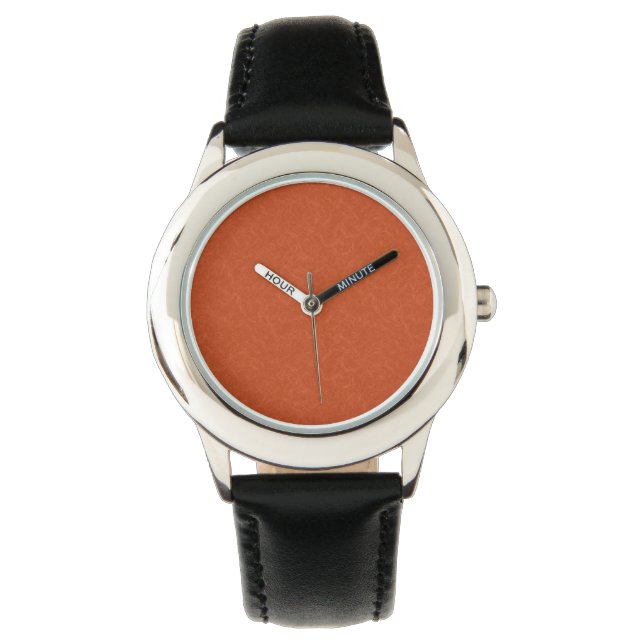 Orangefarbene texturierte Oberfläche mit wirbelnde Armbanduhr (Vorderseite)