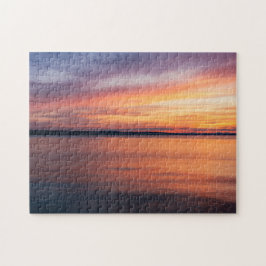 Orangefarbene und Lila Sonnenuntergangswolken über Puzzle