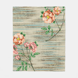 Orangefarbene und rosa Vintage Blume mit grünen Bl Fleecedecke