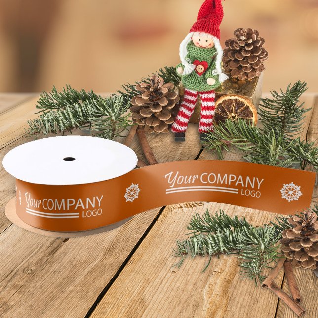 Orangefarbene weiße Werbelogos Schneeflocken Weihn Ripsband (orange company logo ribbon for Christmas holiday gifts, orange ribbon with white snowflakes)