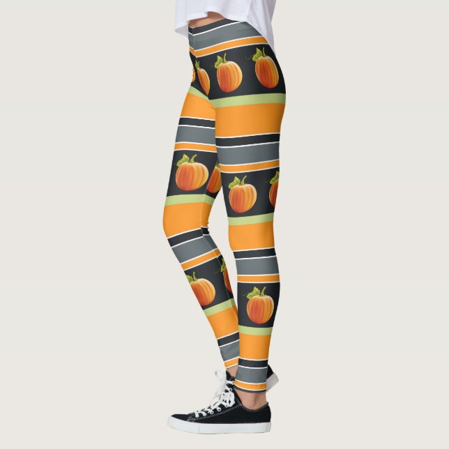 Orangefarbener Kürbis auf lebendiges Streifenmuste Leggings (Links)