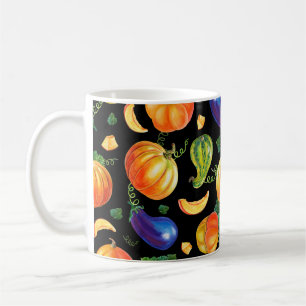 Orangefarbener Kürbis, gestreifter Zucchini, blaue Kaffeetasse