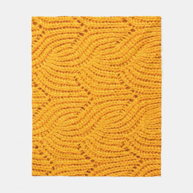 Orangefarbener Pullover, texturierter Hintergrund. Fleecedecke (Vorderseite)