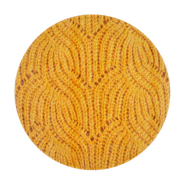 Orangefarbener Pullover, texturierter Hintergrund. Schneidebrett (Vorderseite)