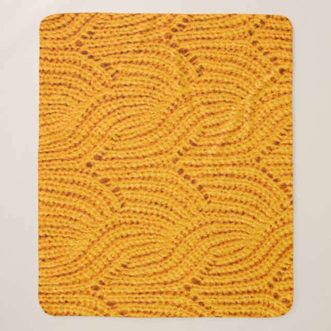 Orangefarbener Pullover, texturierter Hintergrund. Sherpadecke (Vorderseite)