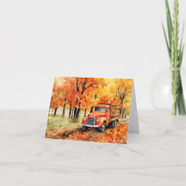 Orangefarbener Vintager Lieferwagen LKW im Herbstf