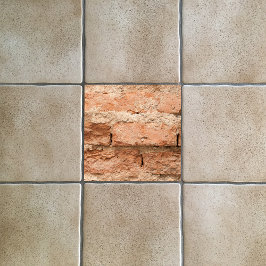 Orangefarbener Ziegelstein und Mortaruntergrund Fliese