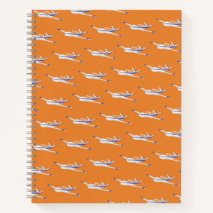 Orangefarbenes Flugzeugnotebook, Beechcraft Bonanz Notizbuch