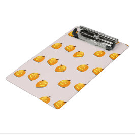 Orangefarbenes Kürbiskopfmuster Mini Klemmbrett