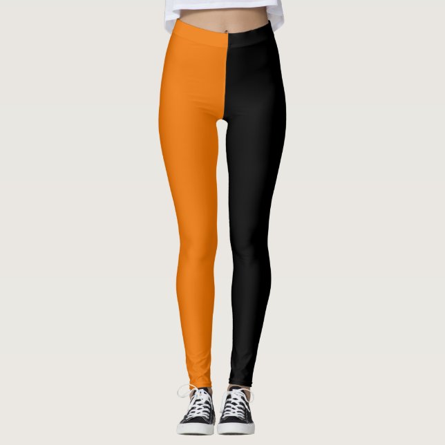 Orangefarbenes Schwarz, zwei Tone, Halbfarbigkeit Leggings (Vorderseite)