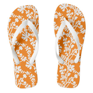 Orangefarbenes und weißes, florales Wiederholmuste Flip Flops