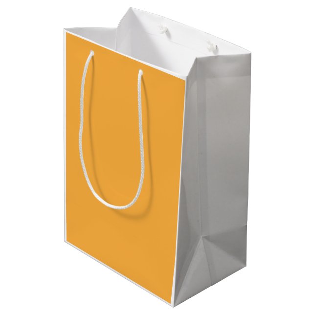 Orangene Geschenktasche Mittelgroße Papiertasche M Mittlere Geschenktüte (Rückseite Schrägansicht)