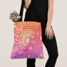 Orangene lila Blumen und sanfter Pfirsichhintergru