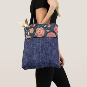 Orangene und rosa Blumen und Jeansstoff