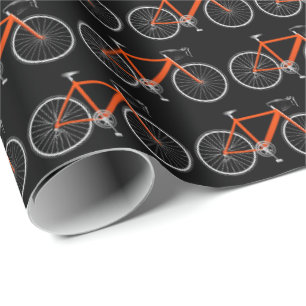 Orangenfahrrad auf schwarzem Papier Geschenkpapier