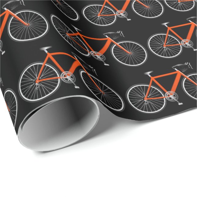Orangenfahrrad auf schwarzem Papier Geschenkpapier (Rolleneckpunkt)