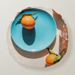 Orangenfrüchte auf Platte Rundes Kissen