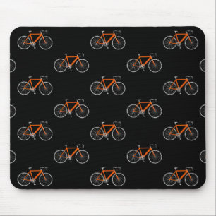 Orangenrad auf schwarz mousepad