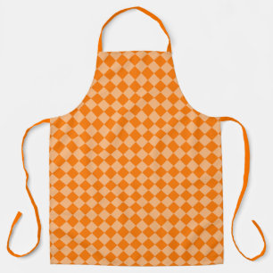 Oranges Diamantmuster mit Schachbrettmuster Schürze