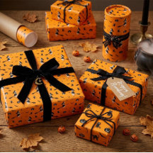 Oranges Halloween-Geschenkpapier mit Hexen