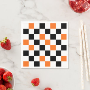 Oranges Schwarz-Weiß kariertes Musterdesign Serviette