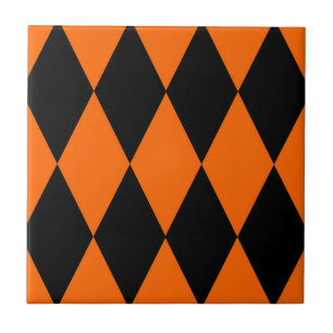 Oranges Schwarzes Harlekin-Diamant-Schachbrettmust Fliese