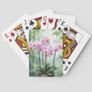 Orchideenpflanze in Rosa auf Bambushintergrund Spielkarten