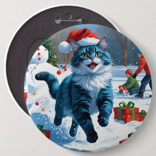 Orientalisch Blaue Katze sitzt im Schnee mit Weihn Button