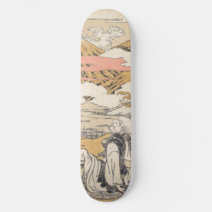 Orientalischer japanischer Mann sitzend mit Blick Skateboard