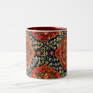Orientalisches Teppichdesign in Blau und Orange Zweifarbige Tasse