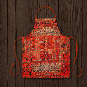 Orientalisches Teppichdesign in hellen Orangen Schürze