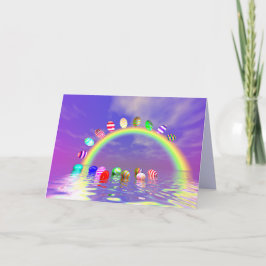 Ostereier auf Regenbogen fahren Feiertagskarte