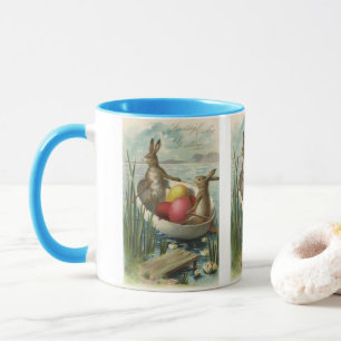 Osterhasen im Vintage-Stil in einem Boot mit Oster Tasse