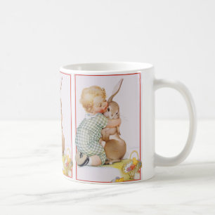 Ostern im Vintage-Stil, süßer kleiner Junge mit Ka Kaffeetasse