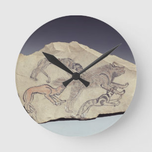 Ostracon depicting a dog chasing a hyena (limeston runde wanduhr