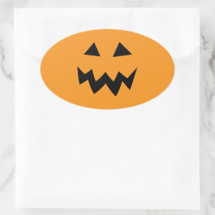 Ovale orange Halloween-Kürbiskopf-Schnitzaufkleber Ovaler Aufkleber