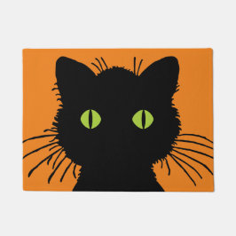 Oversifizierte schwarze Katze mit grünen Wucheln Fußmatte