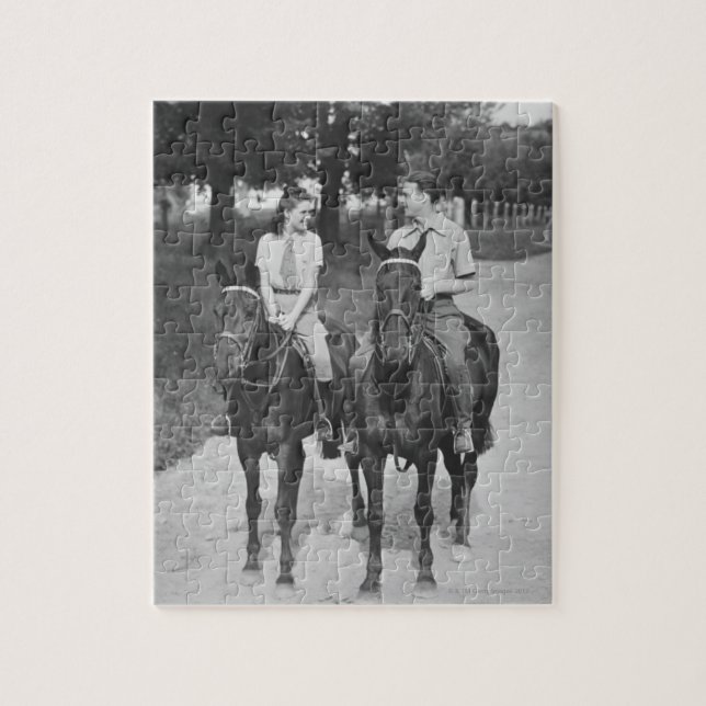 Paar beim Reiten auf Pferden Puzzle (Vertikal)