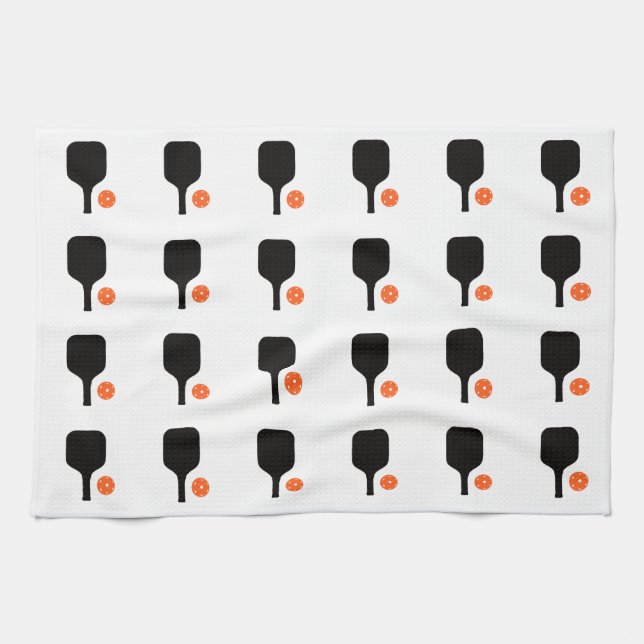 Paddel aus schwarzem Pickleball und Handtuch aus o (Horizontal)