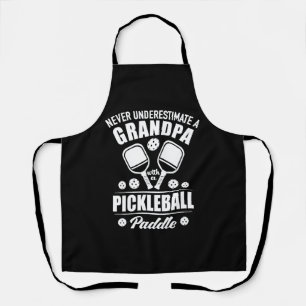 Paddleball - Opa mit Pickleball-Paddel Schürze