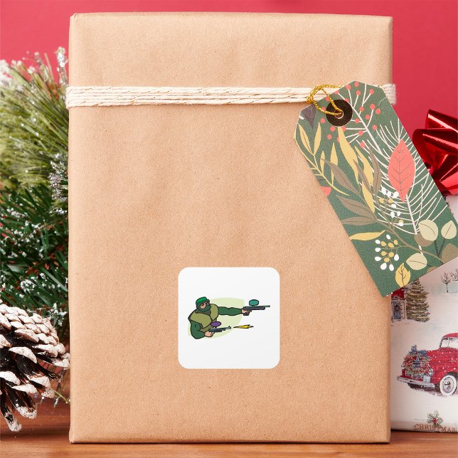 Paintball-Spieler mit Dual-Marker-Action-Sport Quadratischer Aufkleber (Von Creator hochgeladen)