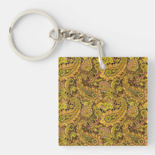 Paisley-Muster in Gelb, Braun auf schwarzem Hinter Schlüsselanhänger