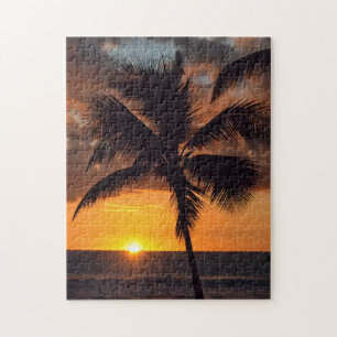 Palme am Sonnenuntergang im Insel-Puzzlespiel Puzzle