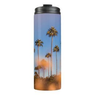 Palme unter blauem Himmel Thermosbecher