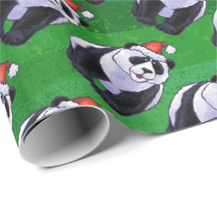 Panda-Bär in der Weihnachtsmannmütze auf Grün Geschenkpapier