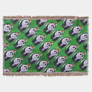 Panda Bear in Weihnachtsmannmütze auf Green Decke
